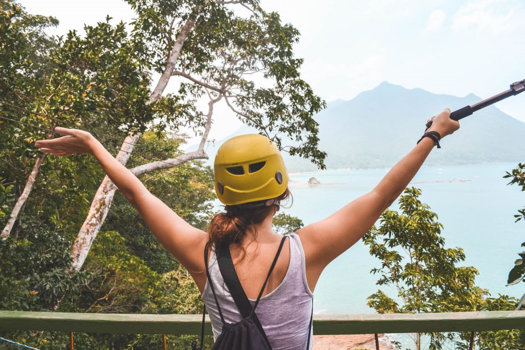 women with helmet before zipline