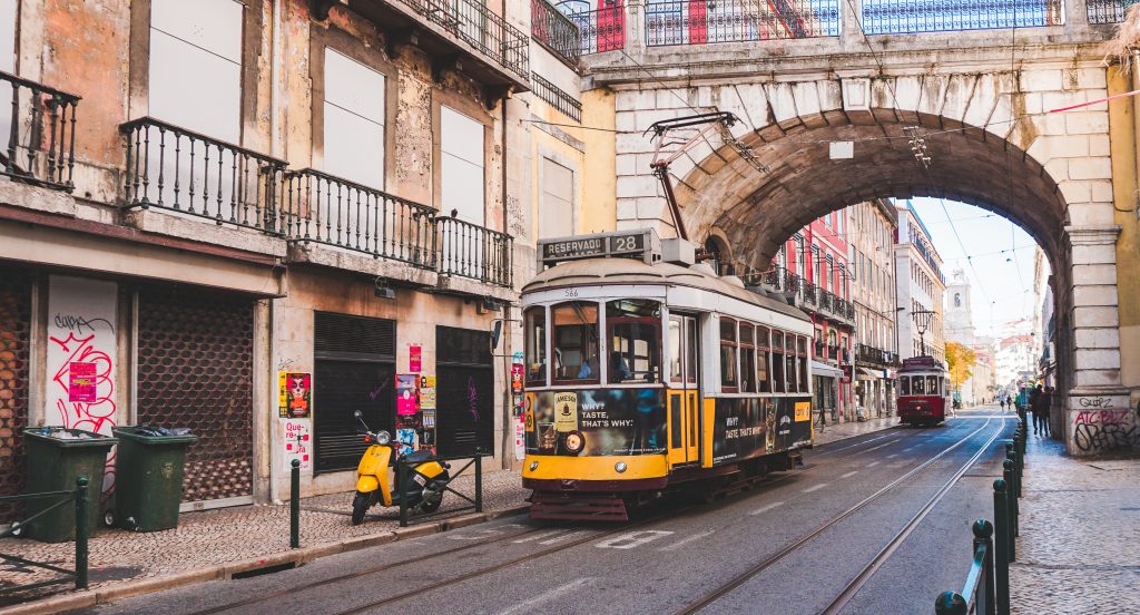 yellow cable car in Lisbon Portugal