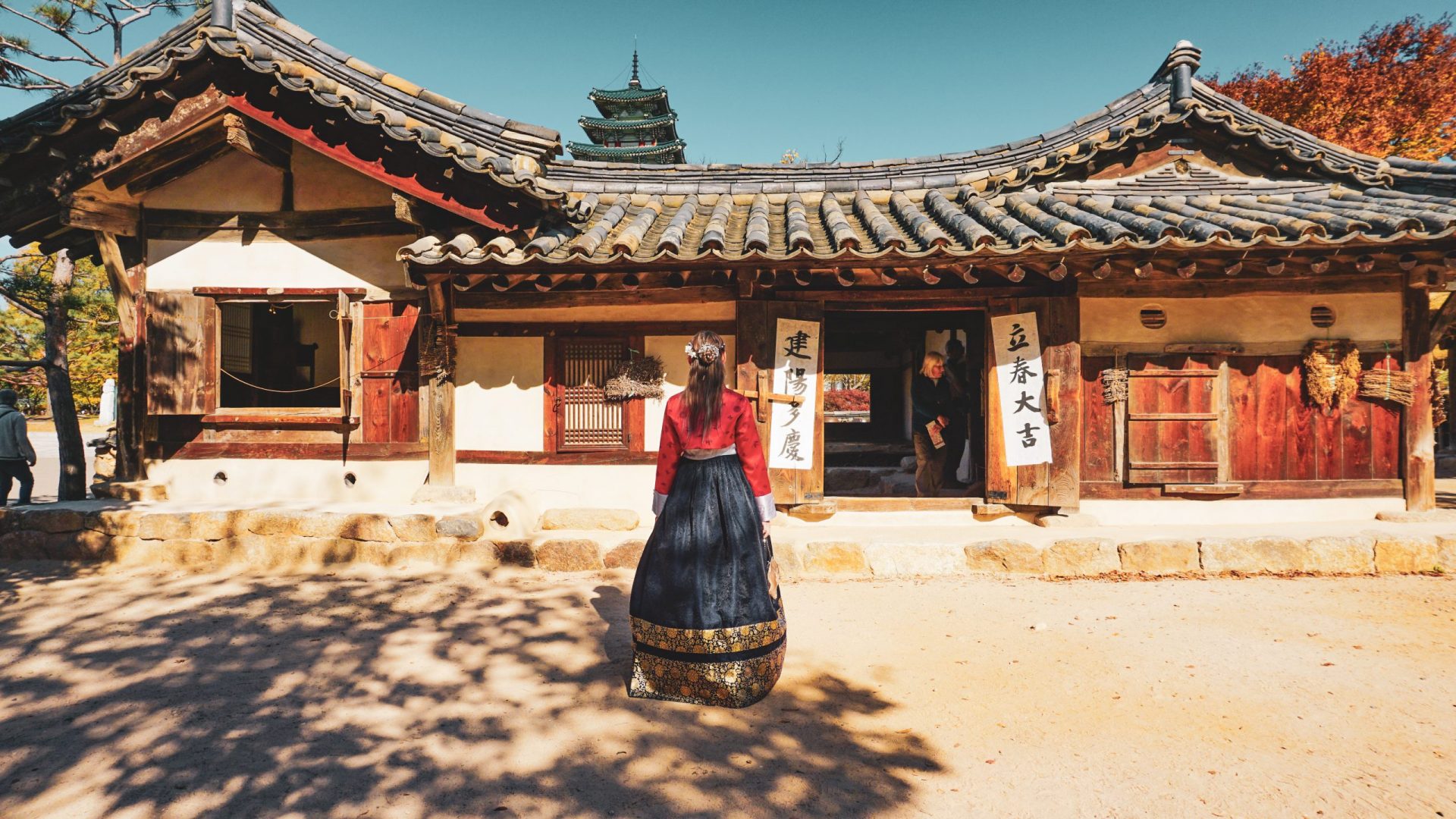 Woman in blue and red Hanbok