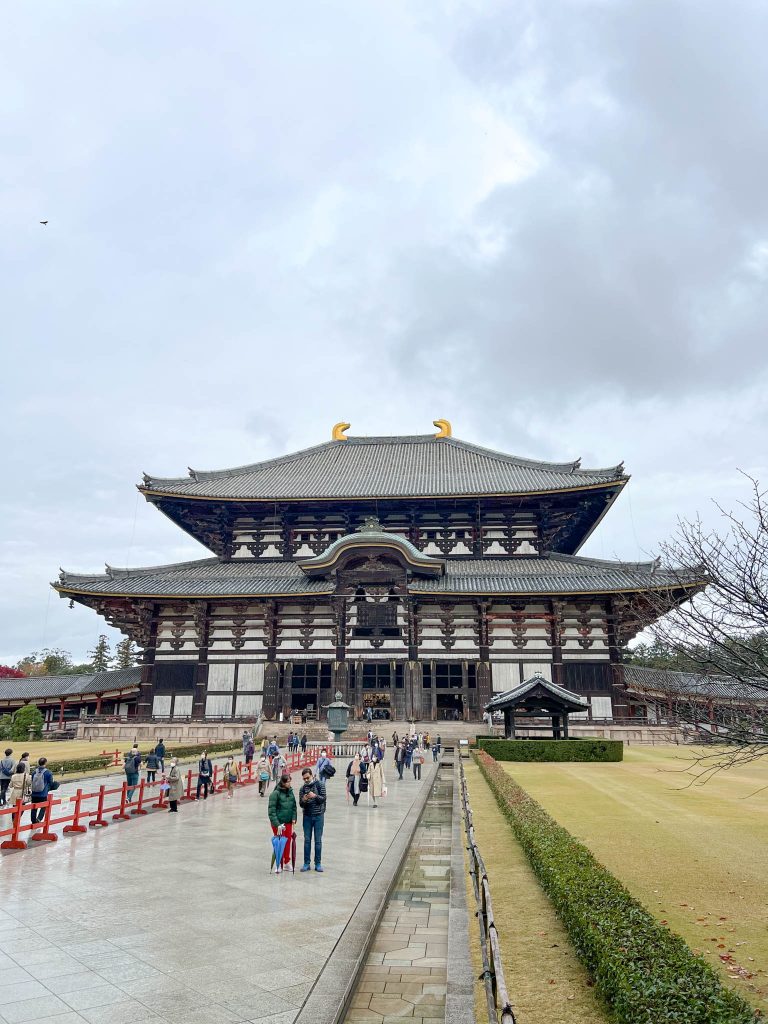 view of Todai-ji temple hall, feeding deer in Nara