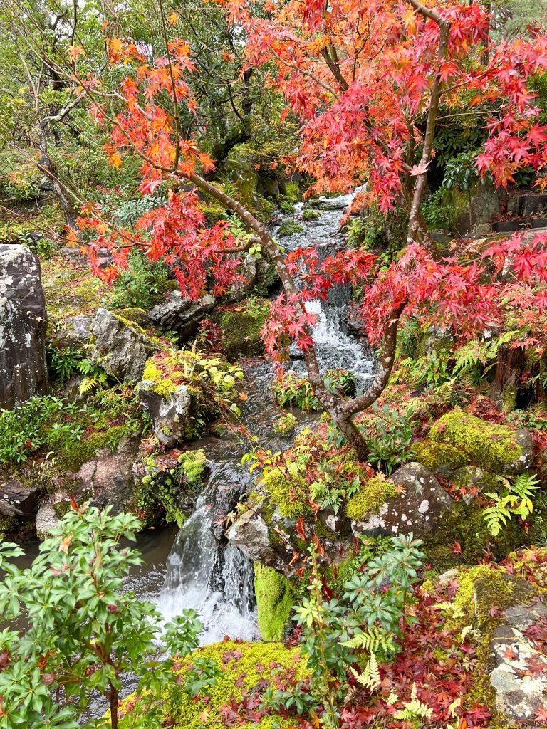 Small waterfall in Isui-en garden in Nara